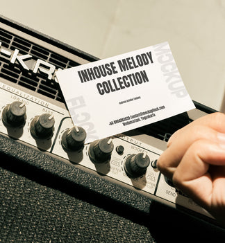 business card mockup leaning on a equalizer