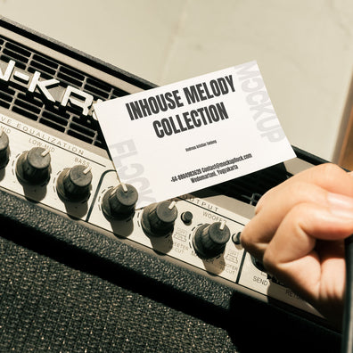 business card mockup leaning on a equalizer