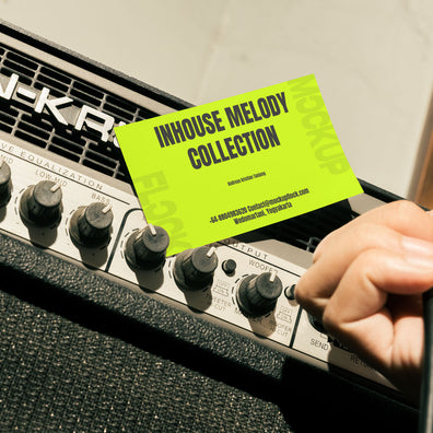 business card mockup leaning on a equalizer