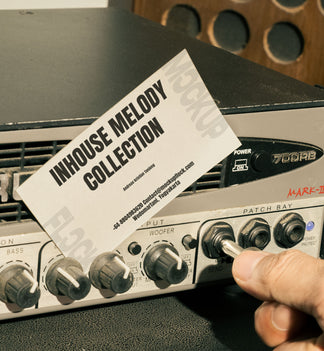 business card mockup leaning on a equalizer