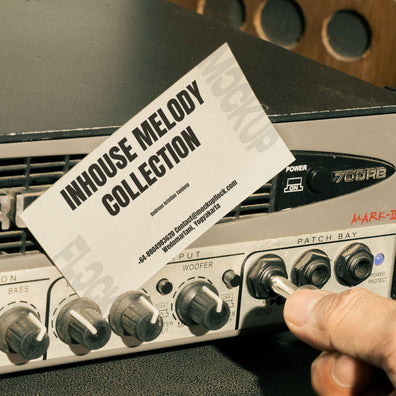 business card mockup leaning on a equalizer