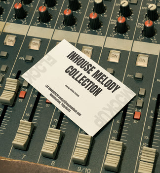 business card mockup leaning on a analog mixer