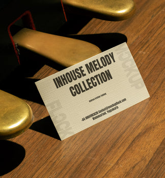 business card mockup leaning on a pedal piano