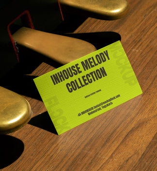 business card mockup leaning on a pedal piano