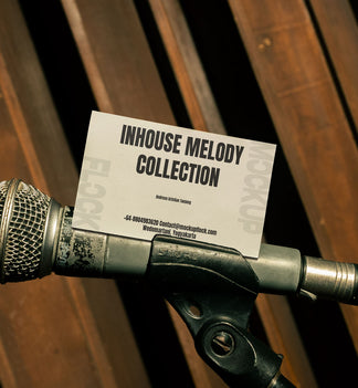 business card mockup leaning on a microphone