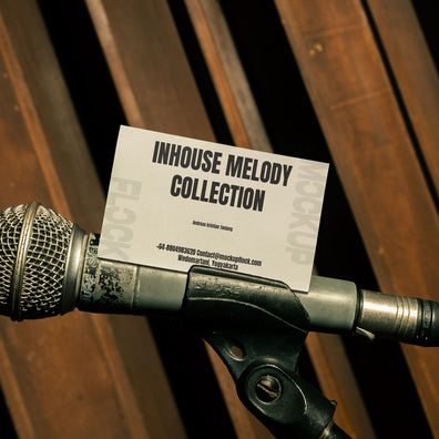 business card mockup leaning on a microphone