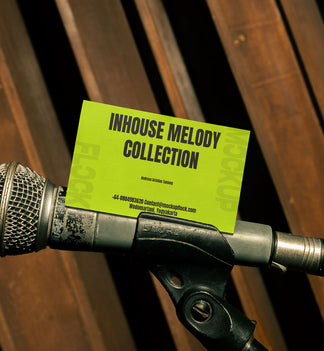 business card mockup leaning on a microphone