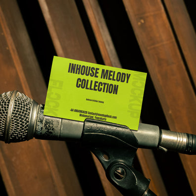 business card mockup leaning on a microphone