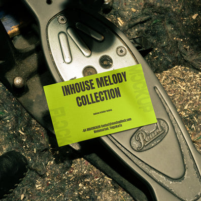 business card mockup leaning on a pedal drums