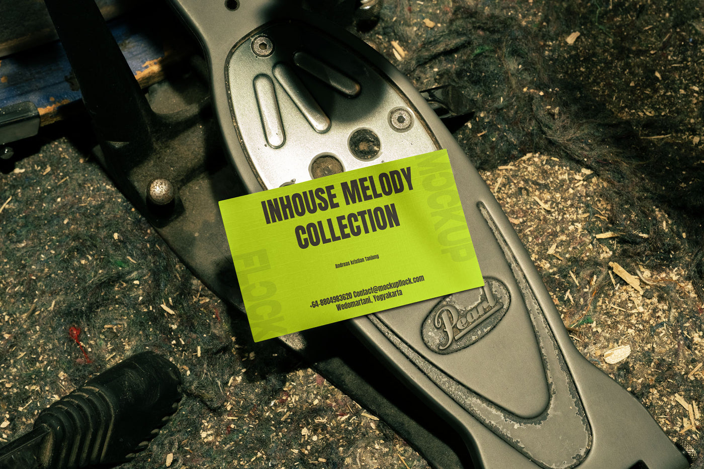business card mockup leaning on a pedal drums