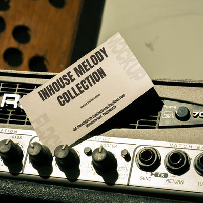 business card mockup leaning on a equalizer