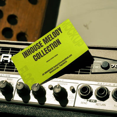 business card mockup leaning on a equalizer