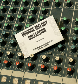 business card mockup leaning on a analog mixer