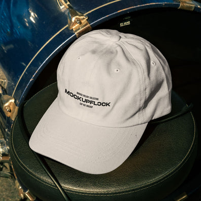 hat mockup leaning on a drum throne