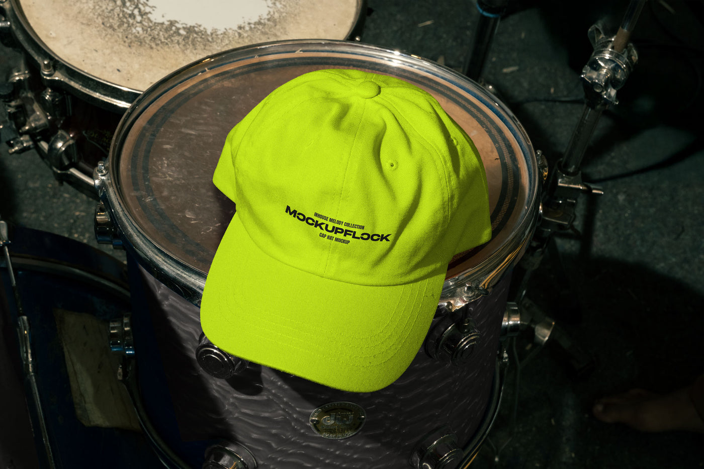 hat mockup leaning on a floor tom drum