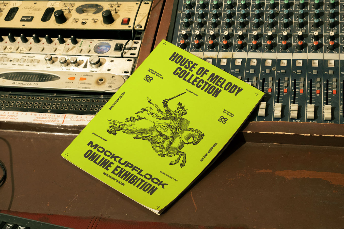 music magazine mockup leaning on a analog mixer, in studio music interior 