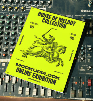 magazine mockup leaning on a analog mixer