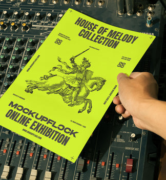 hand holding a poster a4 mockup over an analog mixer