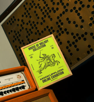 poster frame mockup standing on top of an amplifier