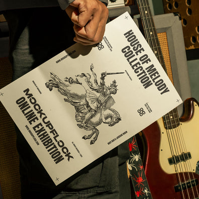 hand holding poster a4 mockup in a music studio