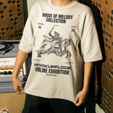 t shirt mockup features a person standing in front of an amplifier