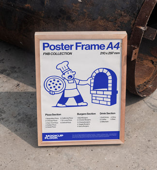 Poster frame mockup leaning on a metal barrel