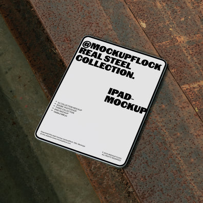 iPad mockup displayed on rusty steel surface