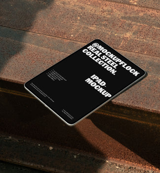 Ipad mockup placed on rusted steel surface