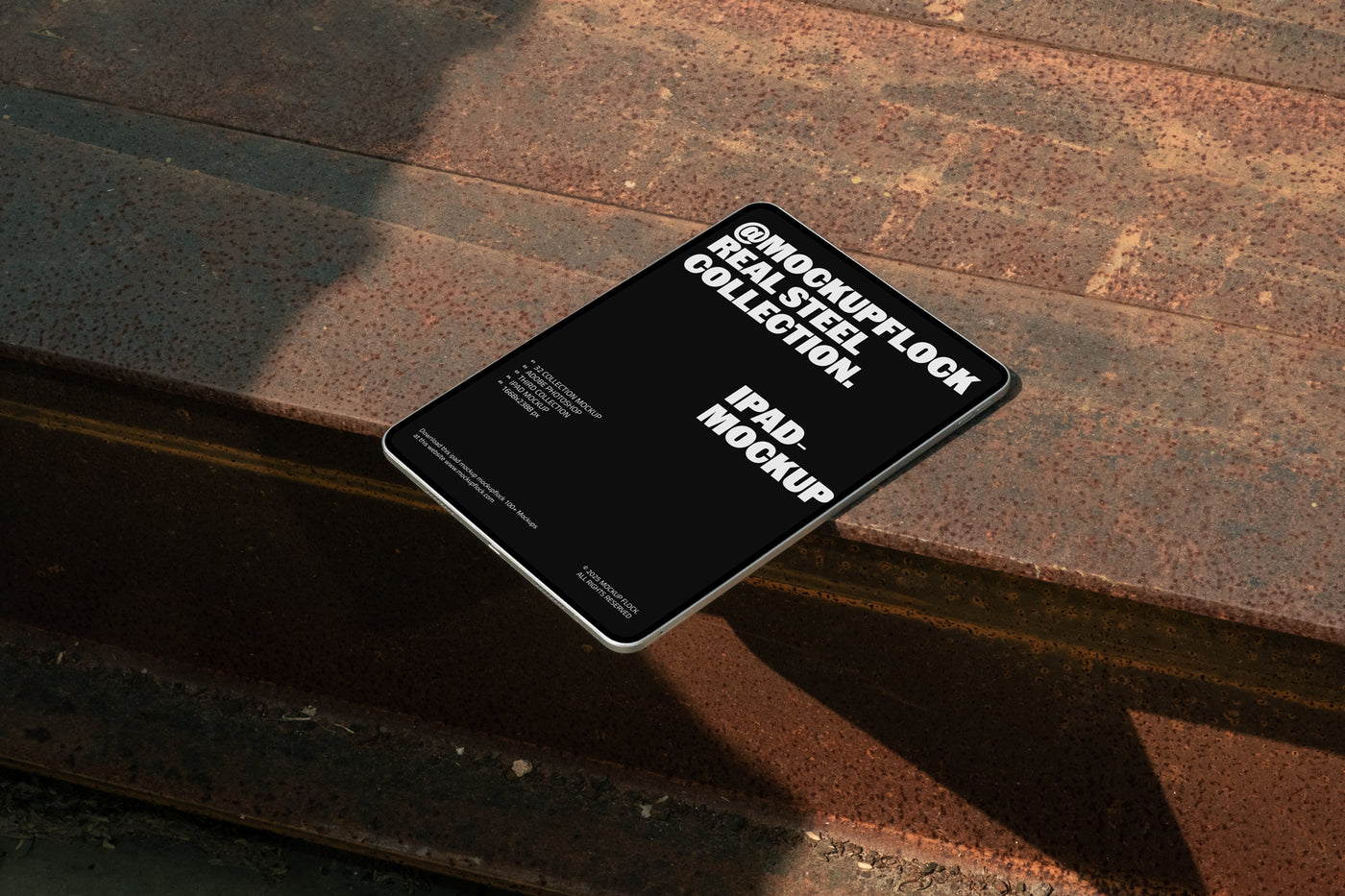 Ipad mockup placed on rusted steel surface