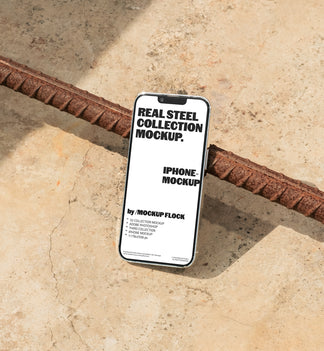 Iphone mockup displayed on a concrete floor with industrial metal rods