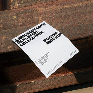 Poster mockup placed on rusted steel surface