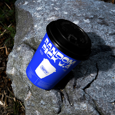 Coffee cup packaging mockup on a rock. made by mockup flock