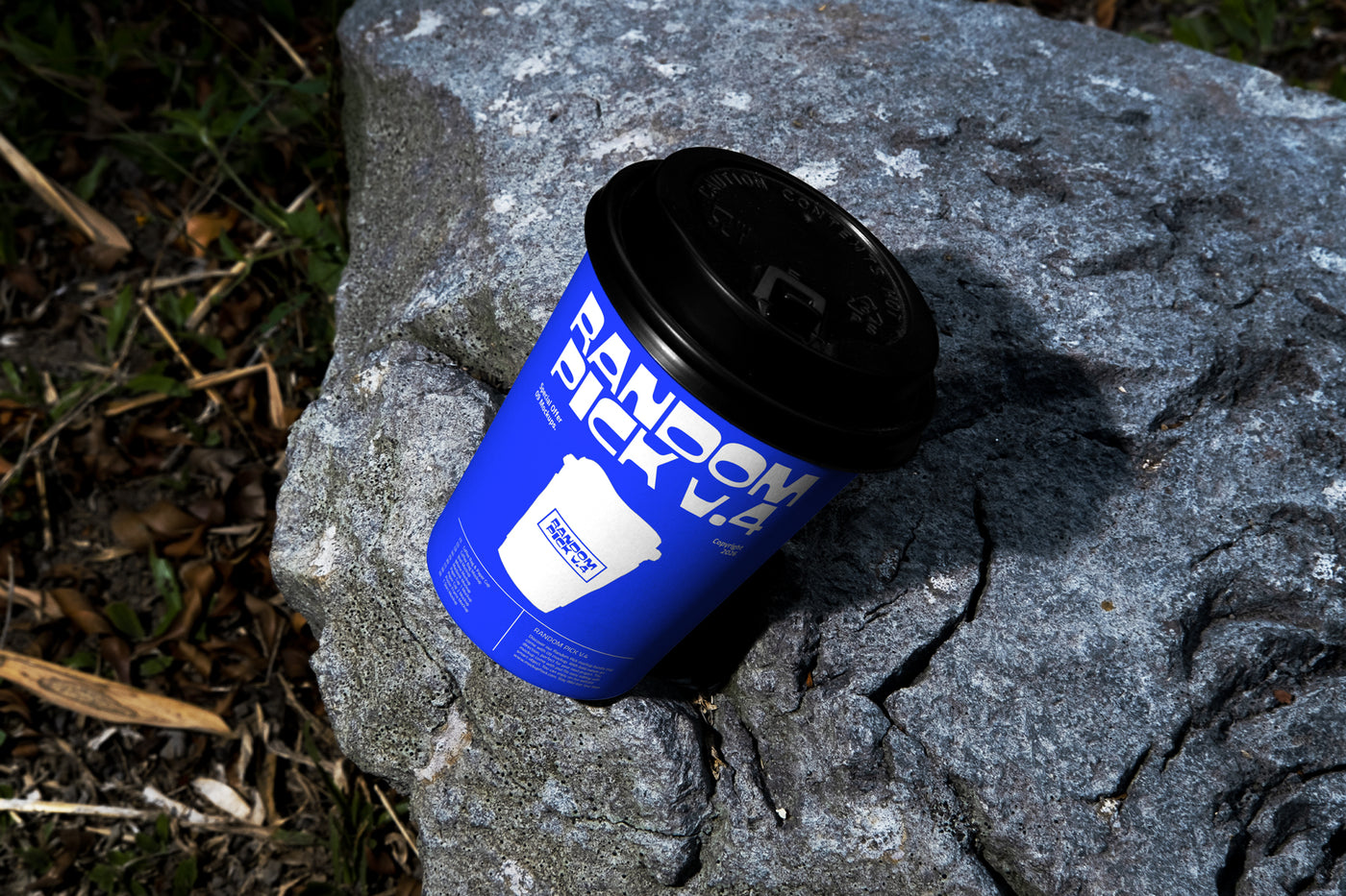 Coffee cup packaging mockup on a rock. made by mockup flock