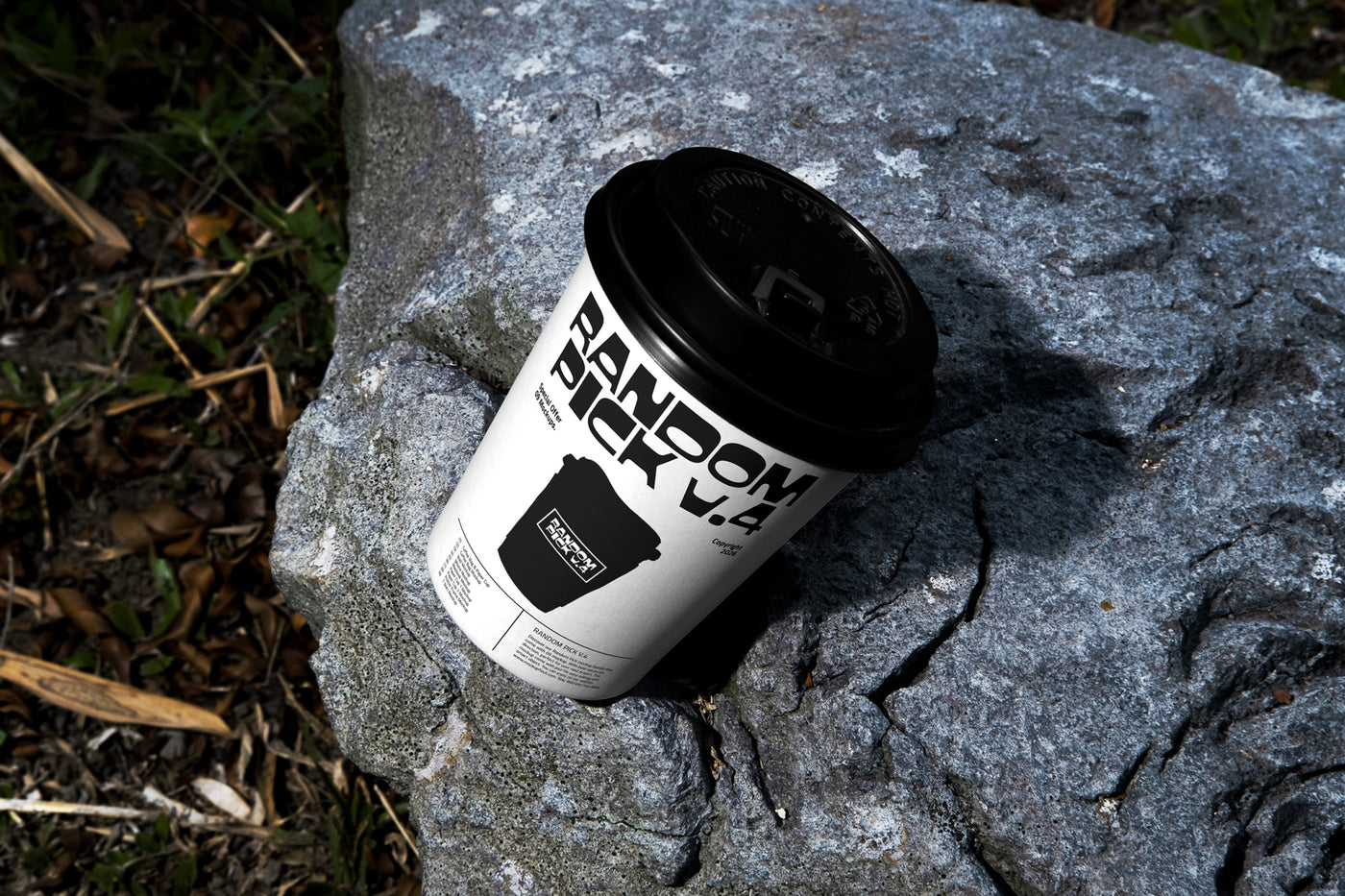Coffee cup packaging mockup on a rock. made by mockup flock
