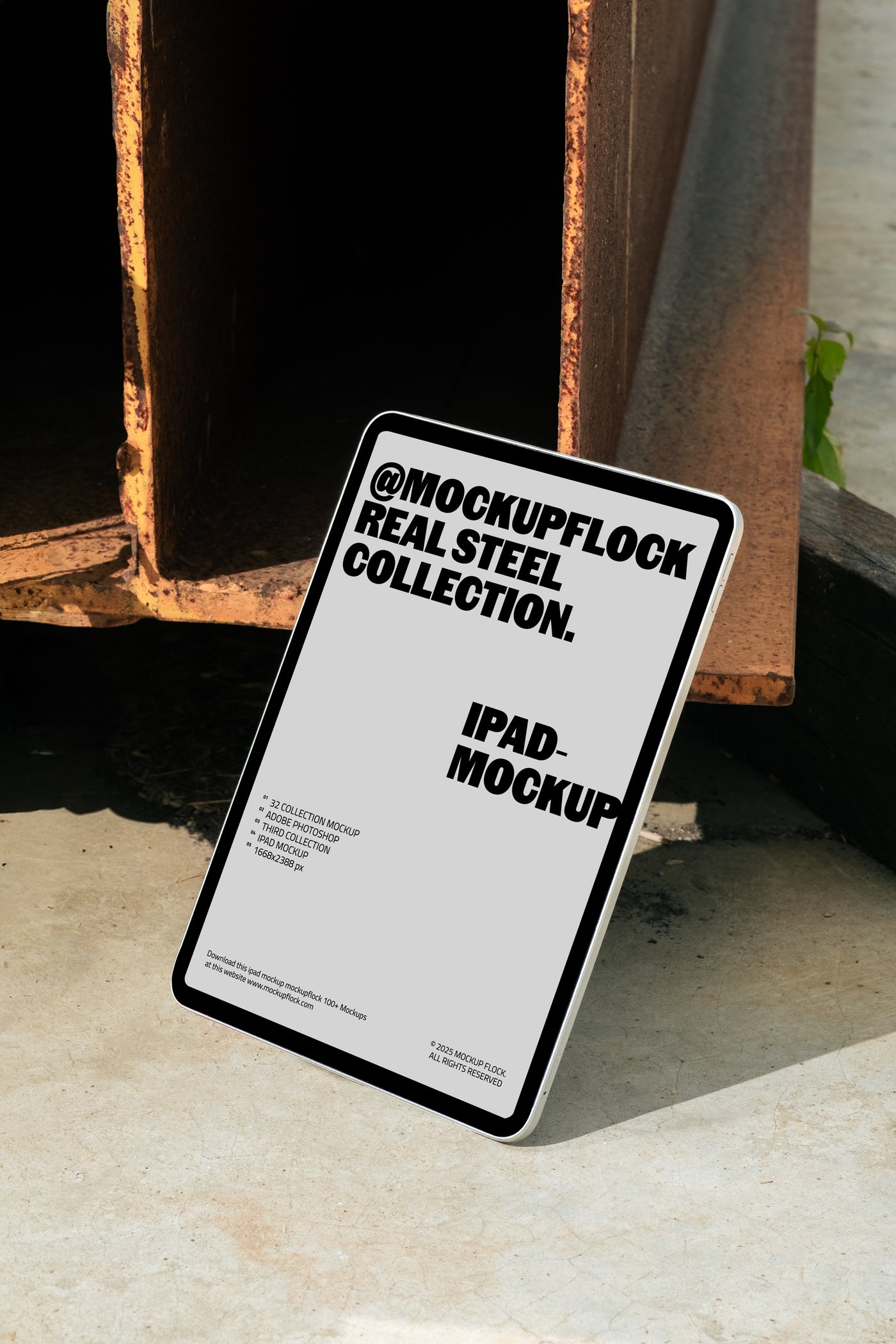 iPad mockup from Mockup Flock Real Steel Collection displayed on concrete floor with industrial rusted steel background for realistic branding presentation.