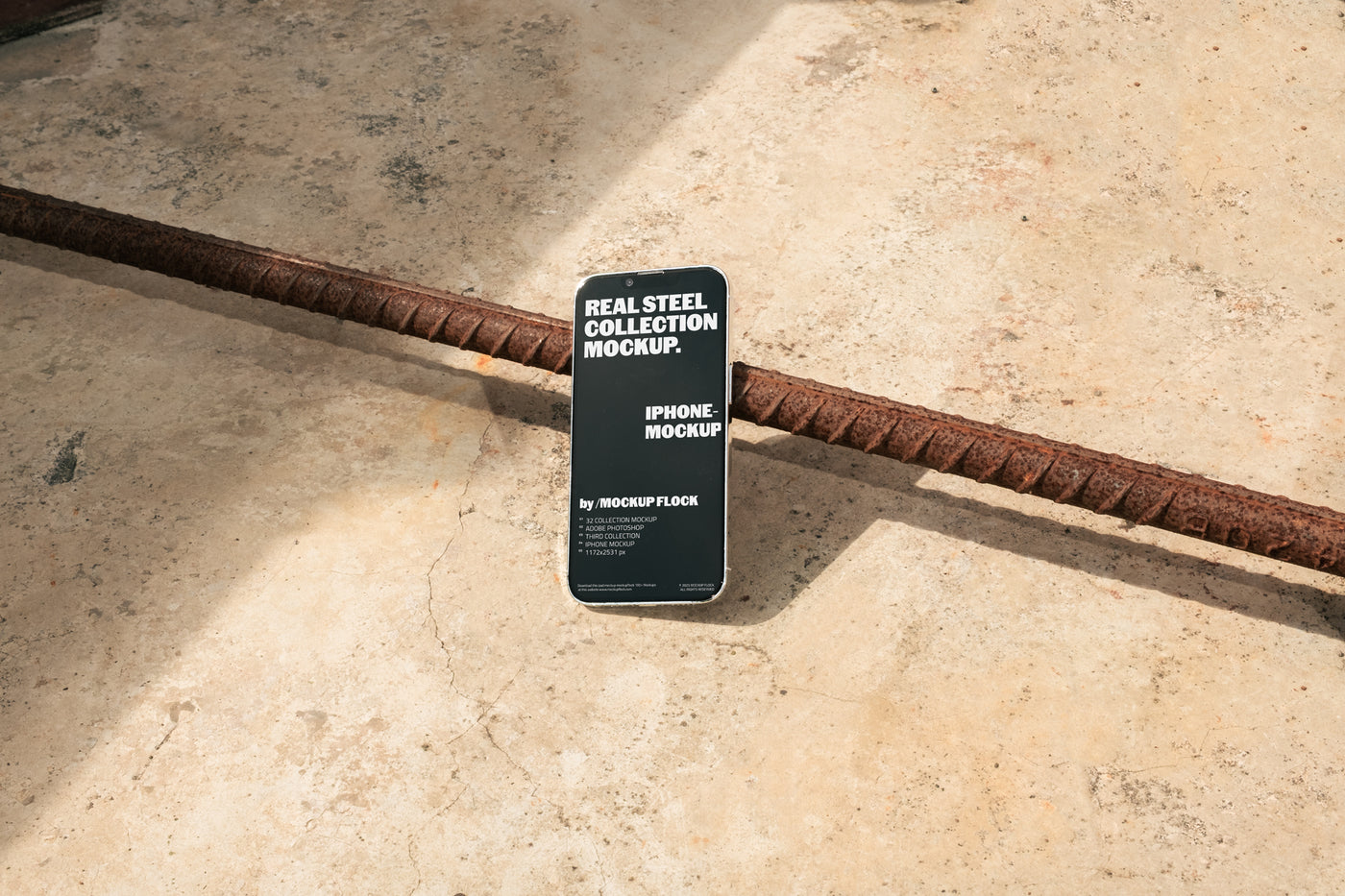 Mockup Flock Real Steel Collection Iphone mockup displayed on a concrete floor with industrial metal rods for realistic product presentation.