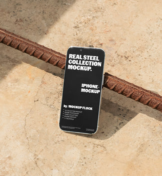 Mockup Flock Real Steel Collection Iphone mockup displayed on a concrete floor with industrial metal rods for realistic product presentation.