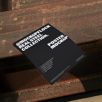 Poster mockup from Mockup Flock Real Steel Collection placed on rusted steel surface for industrial-style product presentation.