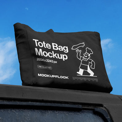 High quality Tote Bag mockup leaning on a roof car. Aesthetic apparel mockup created for Adobe Photoshop by Mockup Flock.