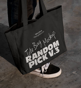 urban tote bag mockup lying on top of black shoes