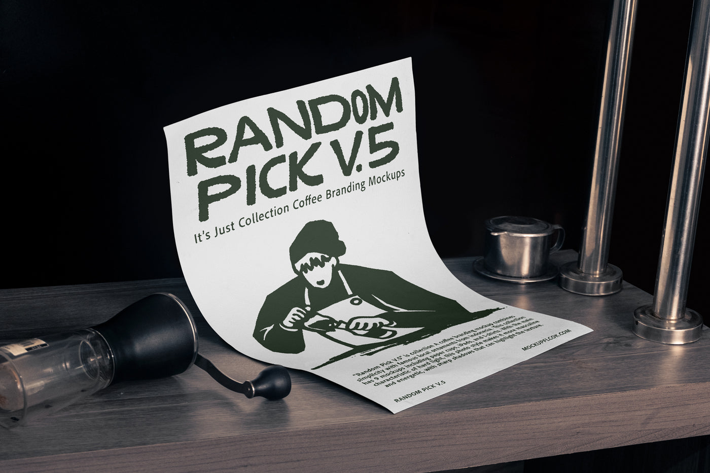 White A4 paper poster leaning upright on a dark wooden bar counter with a coffee grinder and Vietnamese drip filter beside it against a dark background for coffee brand poster mockup