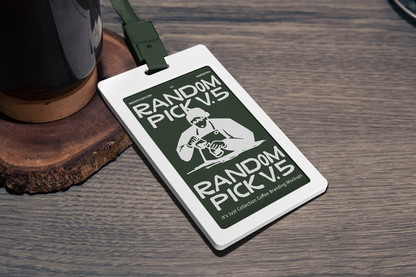 White plastic ID card badge with green lanyard lying at an angle on a rustic wooden table next to a coffee mug and wood coaster, perfect for cafe staff badge branding mockup