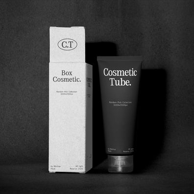 A black cosmetic tube labeled 'Cosmetic Tube.' stands next to a tall white box labeled 'Box Cosmetic.