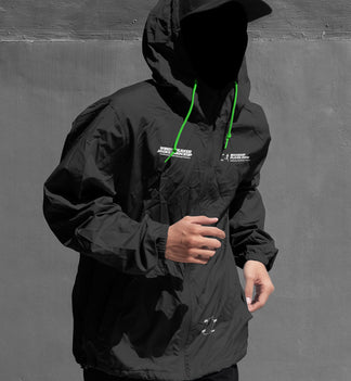 Black and white hooded jacket mockup front view with illustrated smiley face overlay on hood