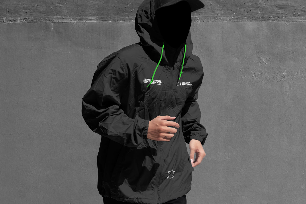 Black and white hooded jacket mockup front view with illustrated smiley face overlay on hood