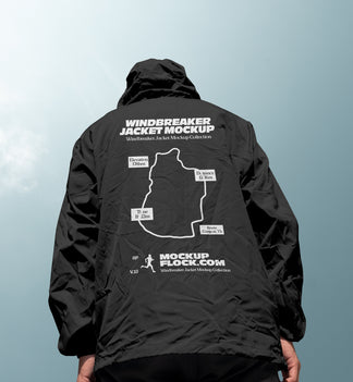 Black hooded windbreaker jacket mockup back view against sky background