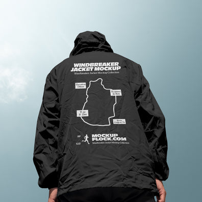 Black hooded windbreaker jacket mockup back view against sky background