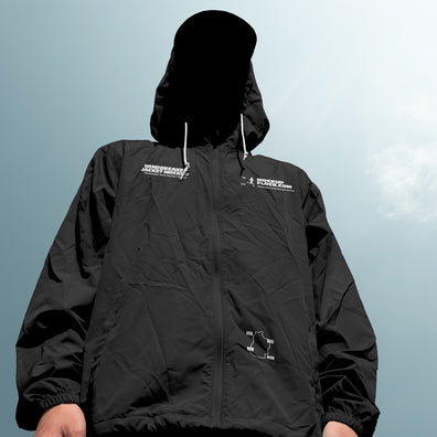 Black windbreaker jacket mockup low angle front view against sky