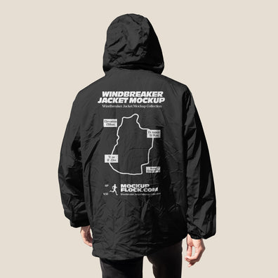 Black hooded windbreaker jacket mockup back view on a neutral studio background