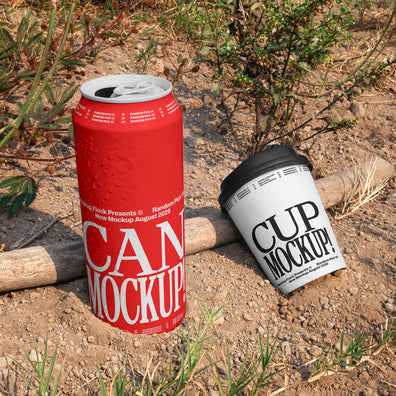 Red aluminum can and white paper coffee cup mockup placed on dry dirt ground with wild plants in the background